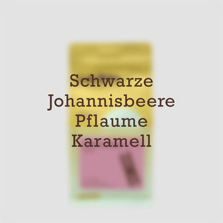 Gasharu Rugori Verpackung mit Text: Schwarze Johannisbeere, Pflaume, Karamell